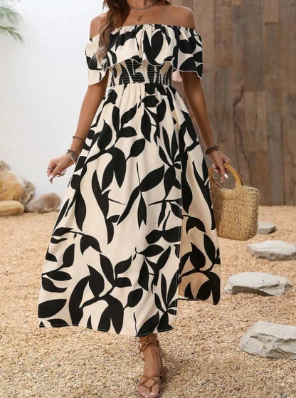 BreezyBelle™ maxi dress by Nowsaa Store featuring flowy fabric, floral pattern, and sleeveless design for elegant, casual wear