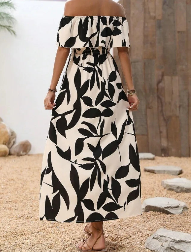 Nowsaa BreezyBelle™ maxi dress with floral pattern, flowing fabric, and sleeveless design perfect for casual or summer occasions.