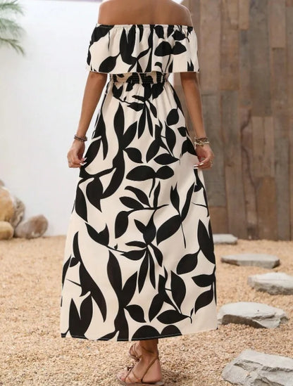 Nowsaa BreezyBelle™ maxi dress with floral pattern, flowing fabric, and sleeveless design perfect for casual or summer occasions.